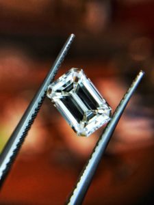 emerald cut with red back